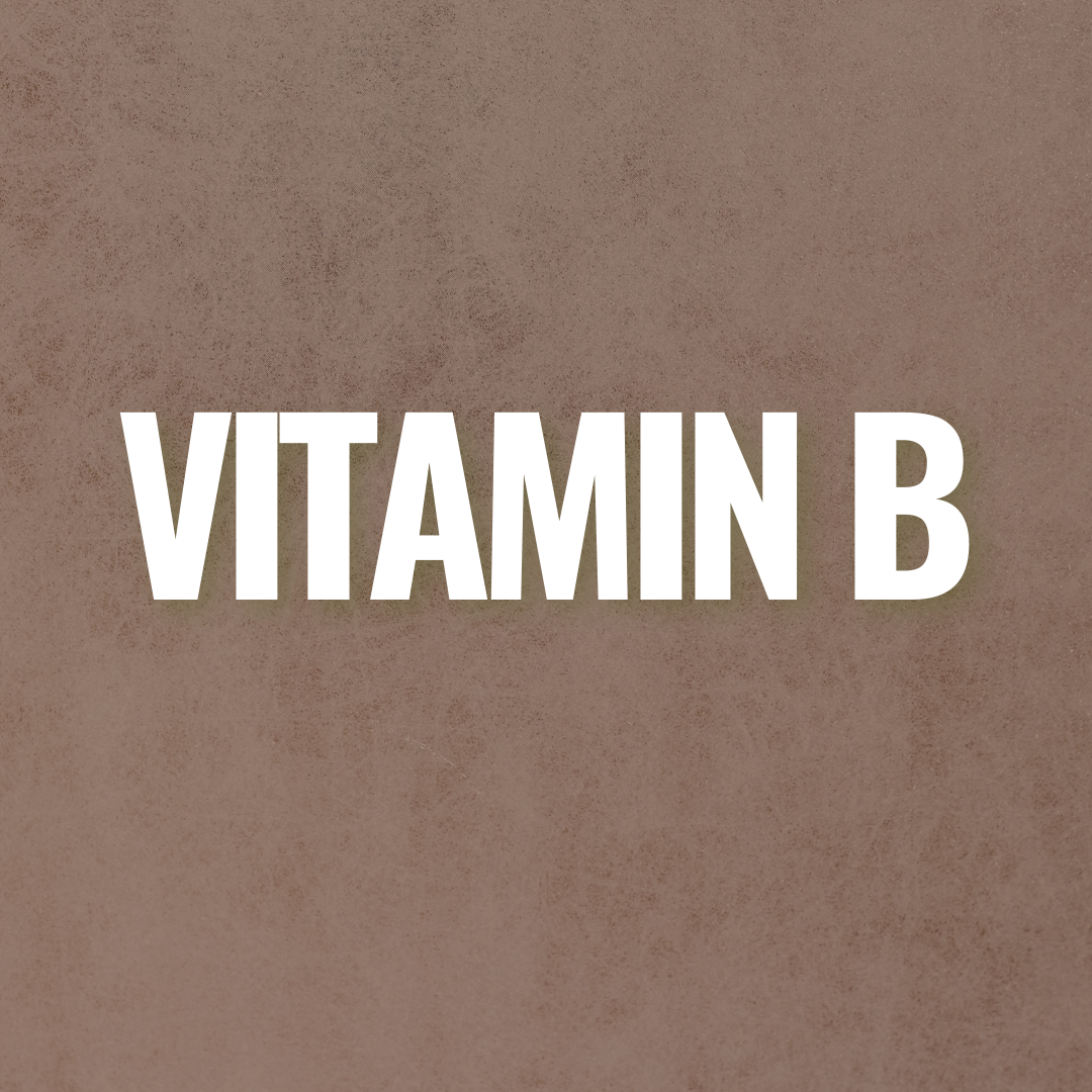 A blackboard with the word vitamin b written on it surrounded by different types of food.