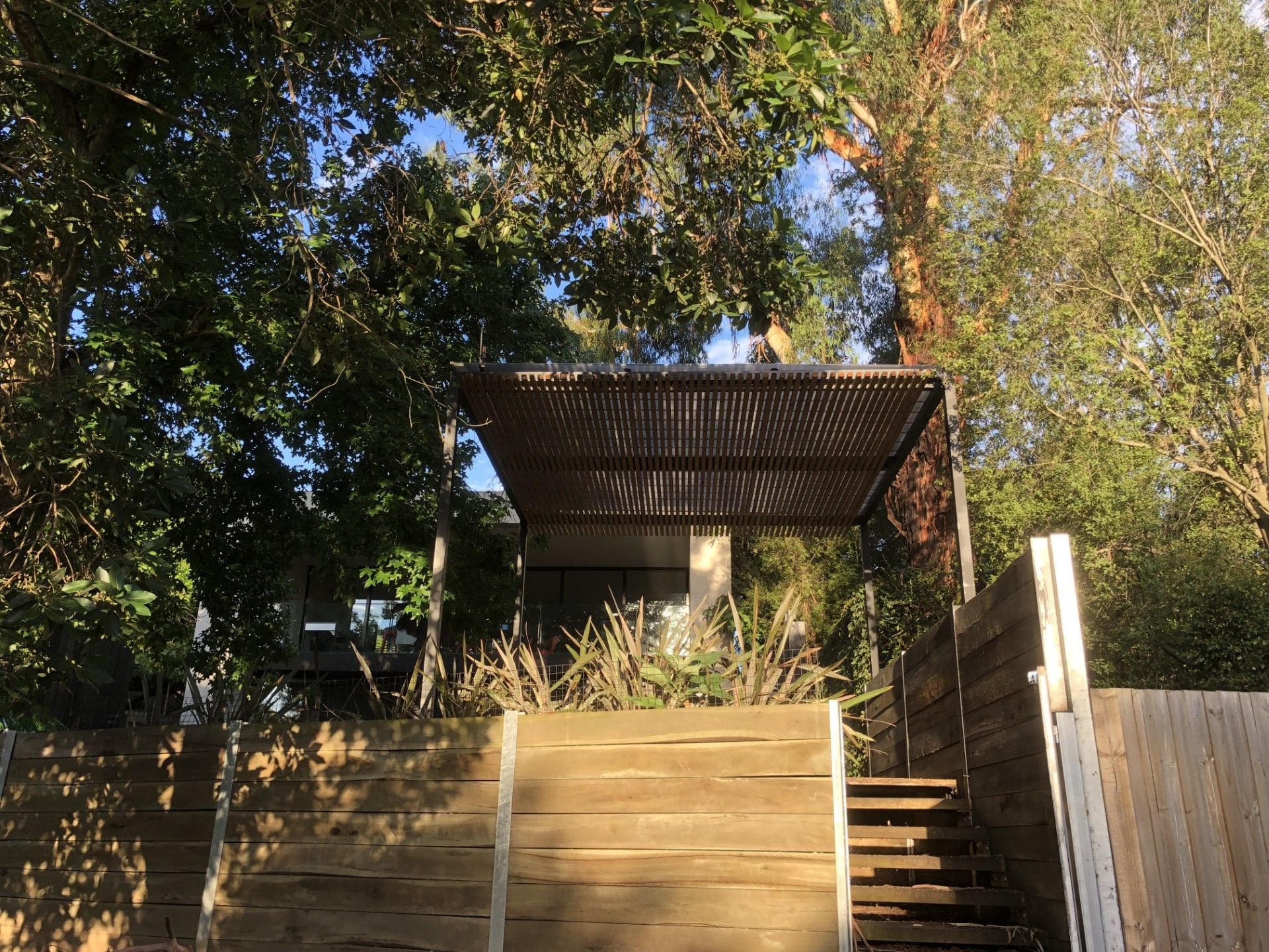 A House Is Being Built with A Concrete Walkway in Front of It — Mezcon Group in Reservoir, VIC