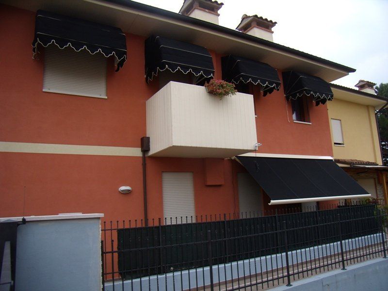 tende da sole a capottina