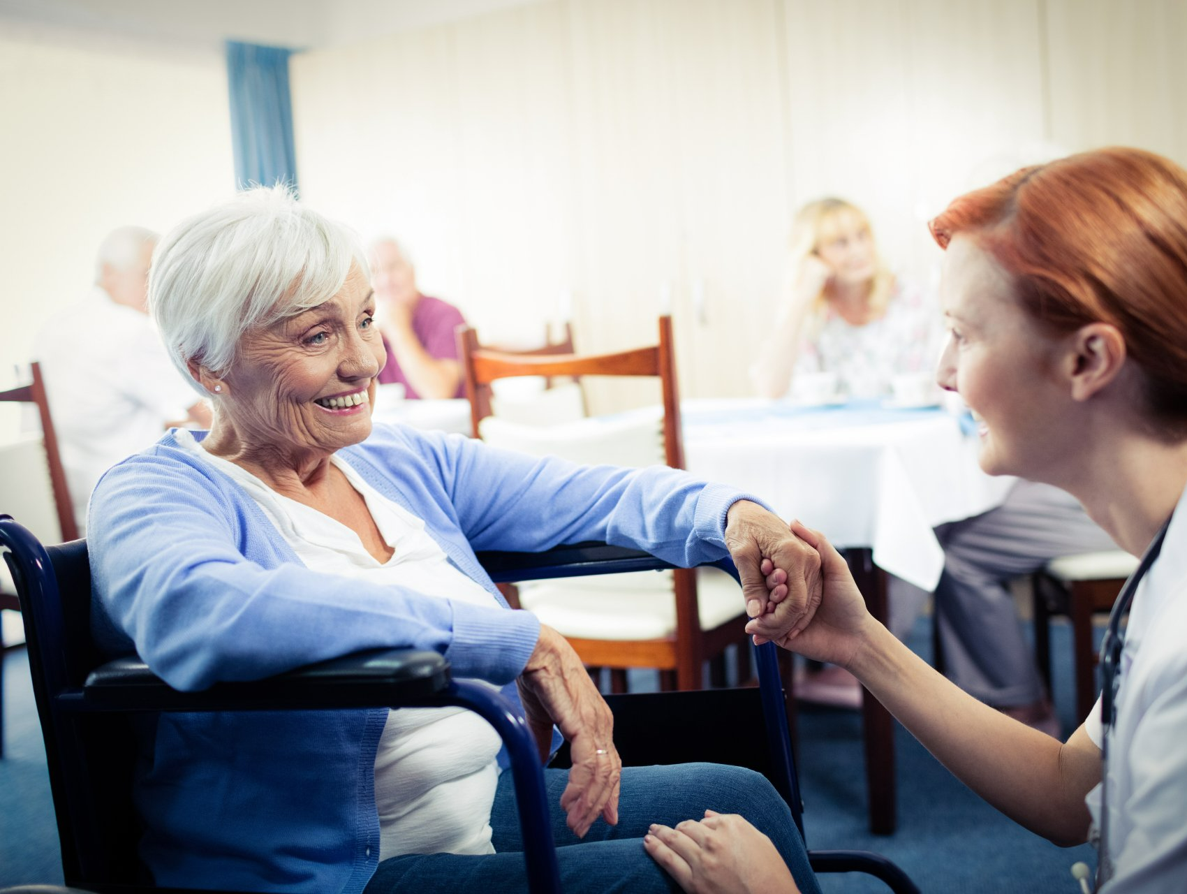 Caregiver Holding Hand