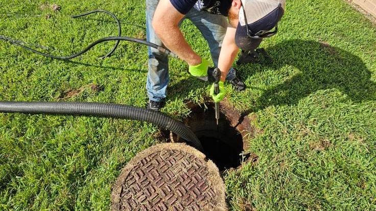 cleaning out septic tank