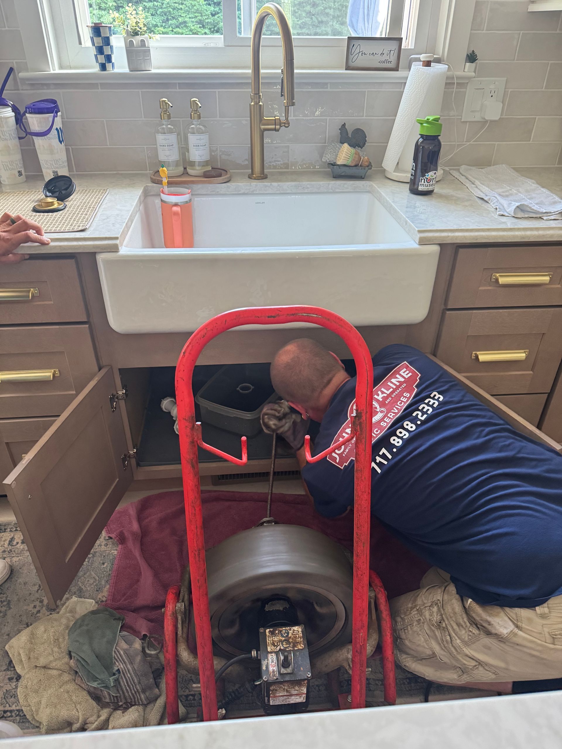 John Kline Septic Technician Working on Drain Clog in Lancaster, PA