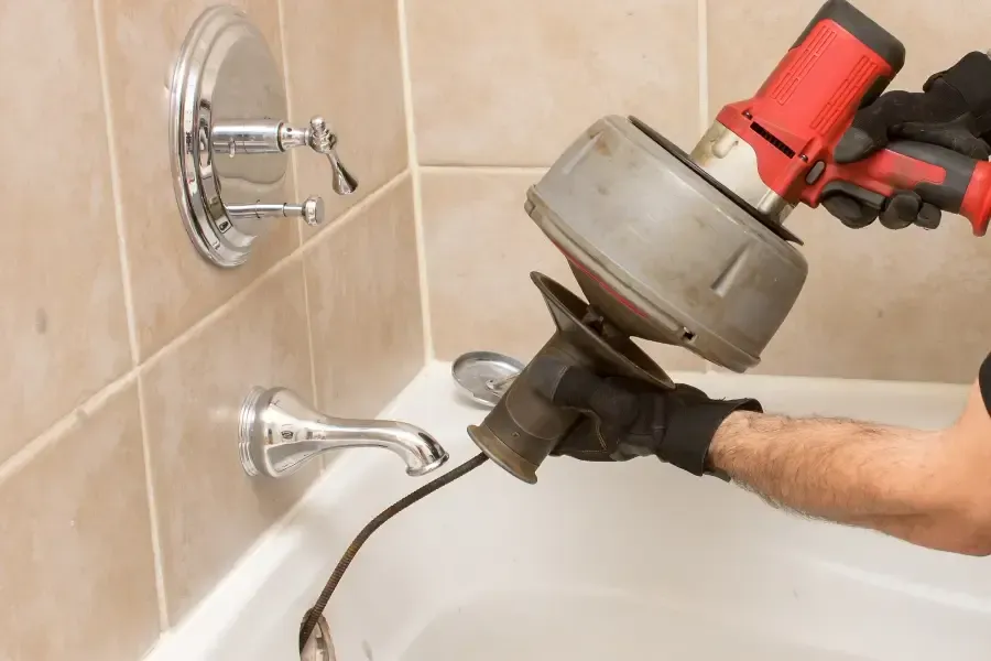 how to clean a shower drain that can't be removed