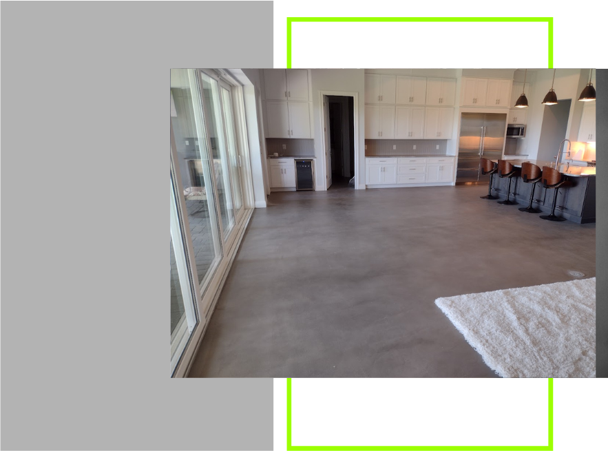 a picture of a kitchen with a concrete floor