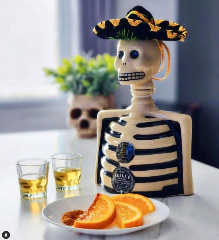 Skelly Tequila with Tajin and Orange Slices