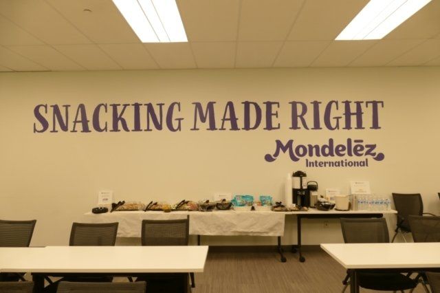 A wall that says snacking made right on it