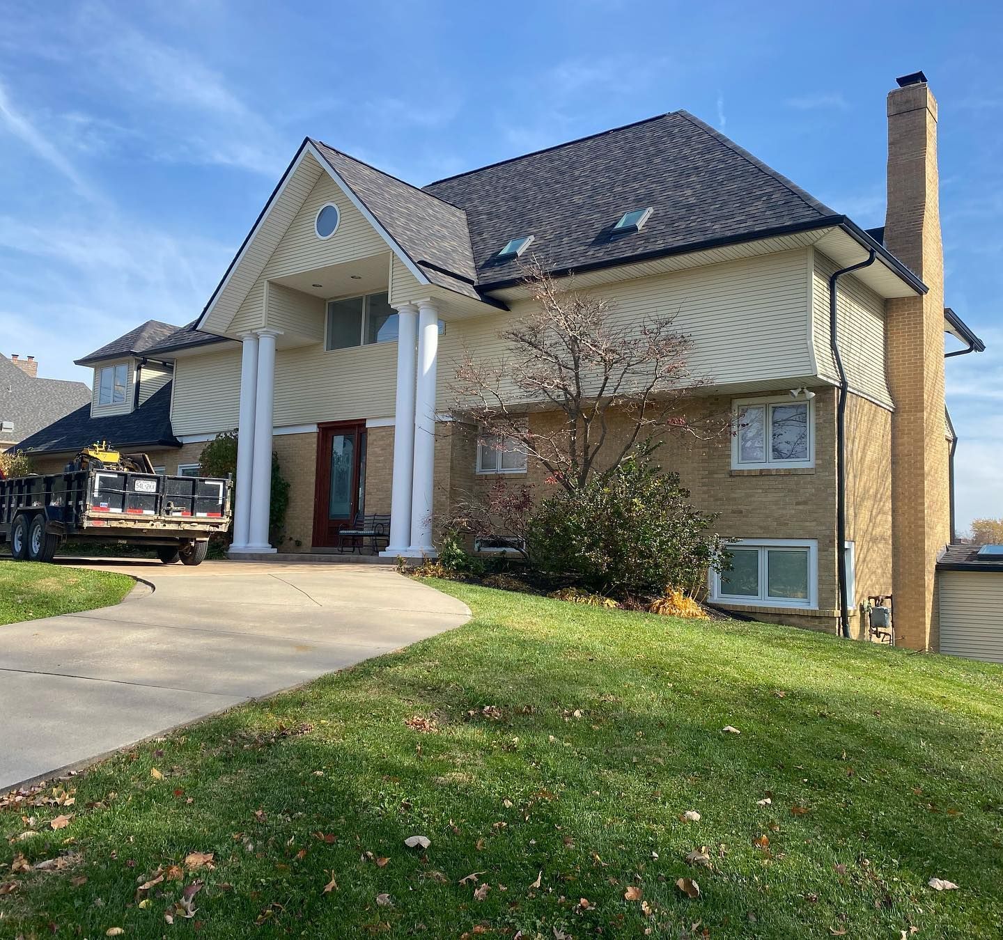 Hose with Brown Siding | Manchester, MO | KPro Roofing & Renovation