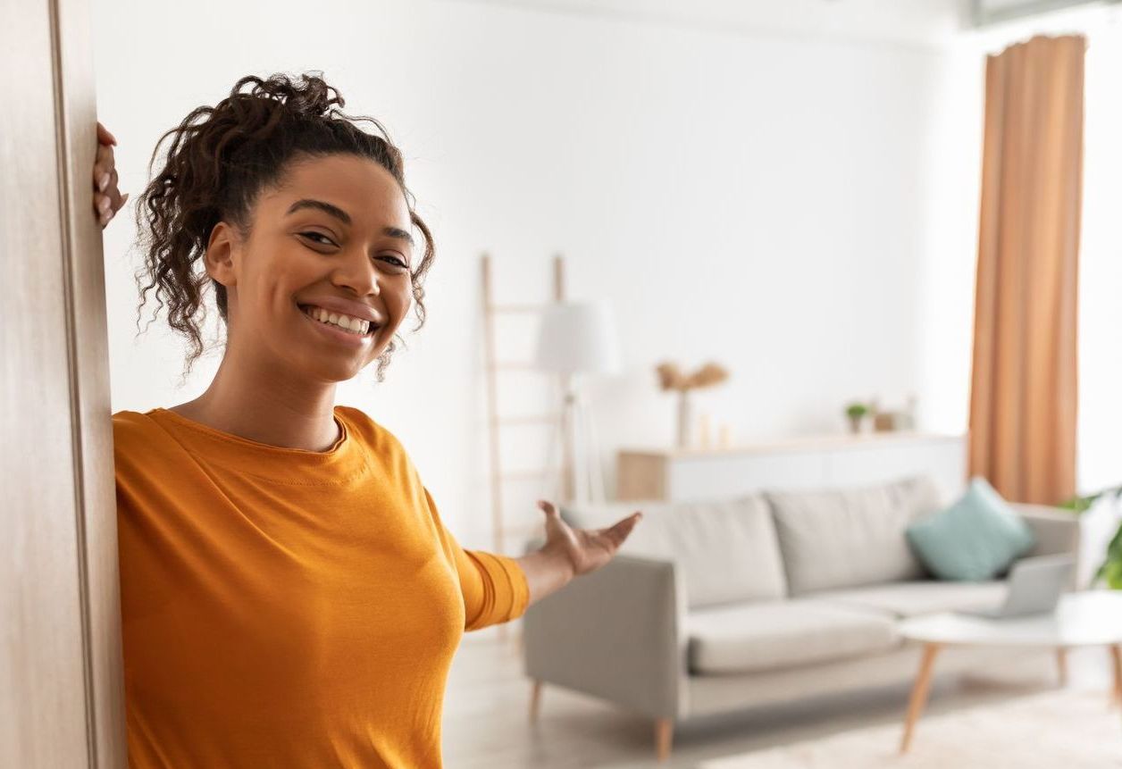 Woman welcoming guests in