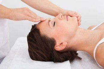 Woman receiving a massage while lying down — Chiropractic in Los Angeles, CA