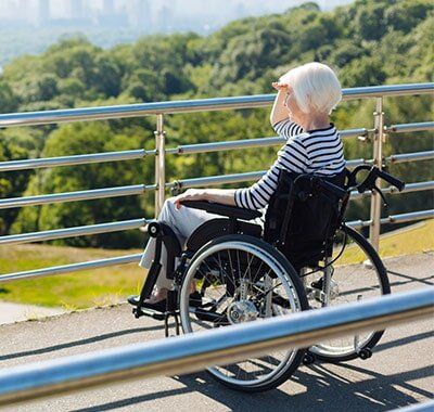Inspired Disabled Lady Looking At The City Skyline — Social Security Attorney in Albany, GA