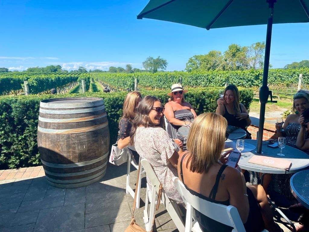 Pellegrini Vineyards Rear Patio Bachelorette Group – Long Island wine tours