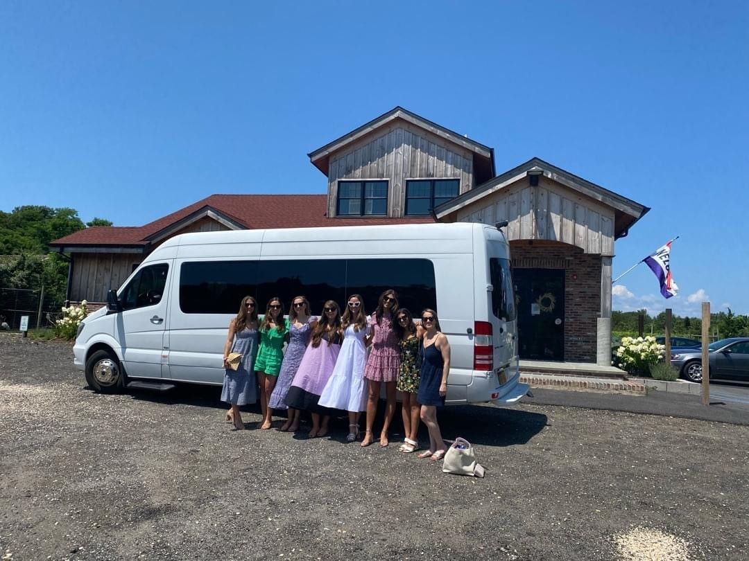 Sannino Vineyard front Entrance with NYC bachelorette Group and East End Wine Tasting Tours' Luxury Sprinter Van
