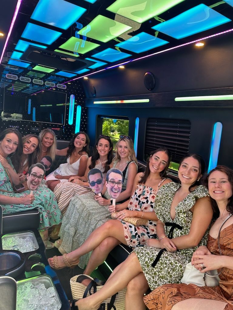 Bachelorette Group posing inside one of East End Wine Tasting Tours' Party Style Vans