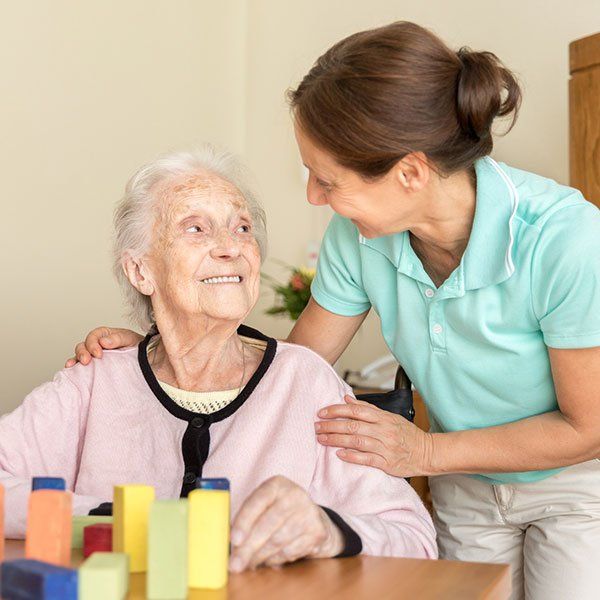 Nurse Talking to Old Lady in Wheelchair | New York, NY | Coney Island Home Care Nurse Talking to Old Lady in Wheelchair | New York, NY | Coney Island Home Care