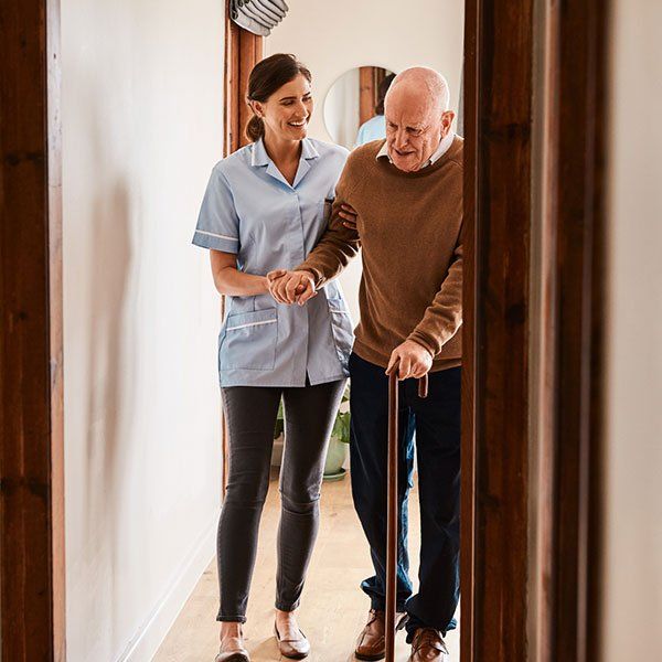 Nurse Assisting a Senior Man | New York, NY | Coney Island Home Care
