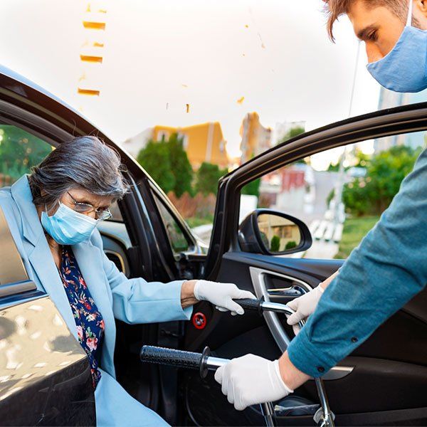 Senior Woman in a Car with Caregiver | New York, NY | Coney Island Home Care
