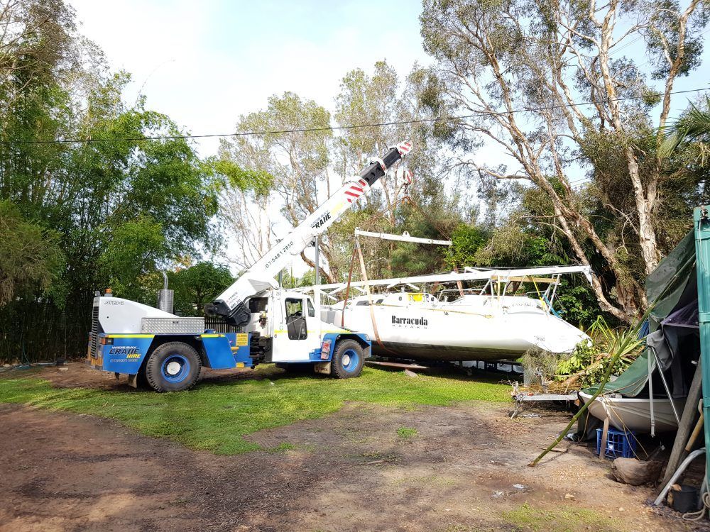 20 Tonne Franna Mobile Cranes Lifting Boat — Pialba, QLD — Wide Bay Crane Hire