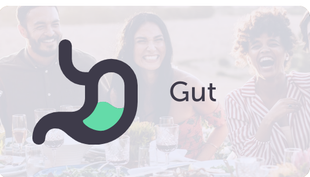 A group of people are sitting at a table with a gut logo in the foreground.