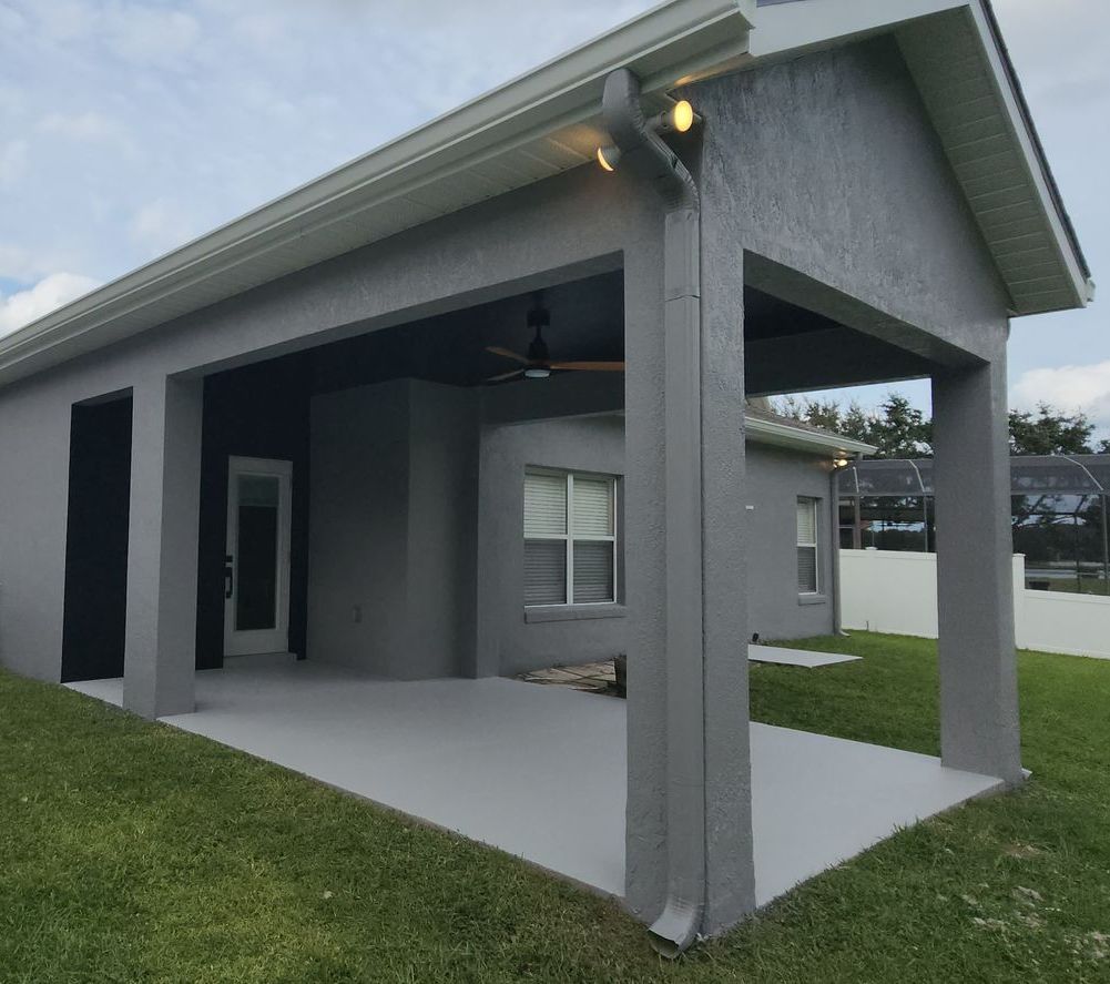 A white bookshelf with the door open in a room.