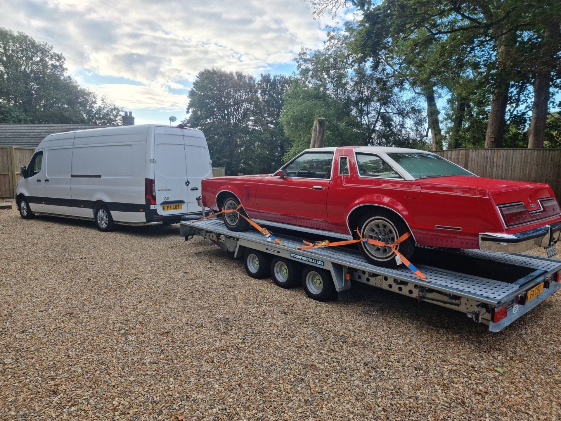 A classic car on a trailer, ready for transport with MTC Transport