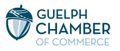 the logo for the guelph chamber of commerce has an acorn on it .