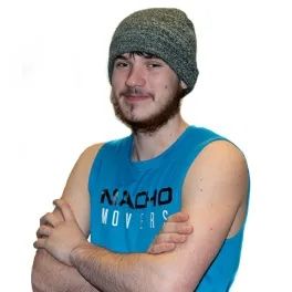 a man wearing a hat and a blue tank top that says nacho movers