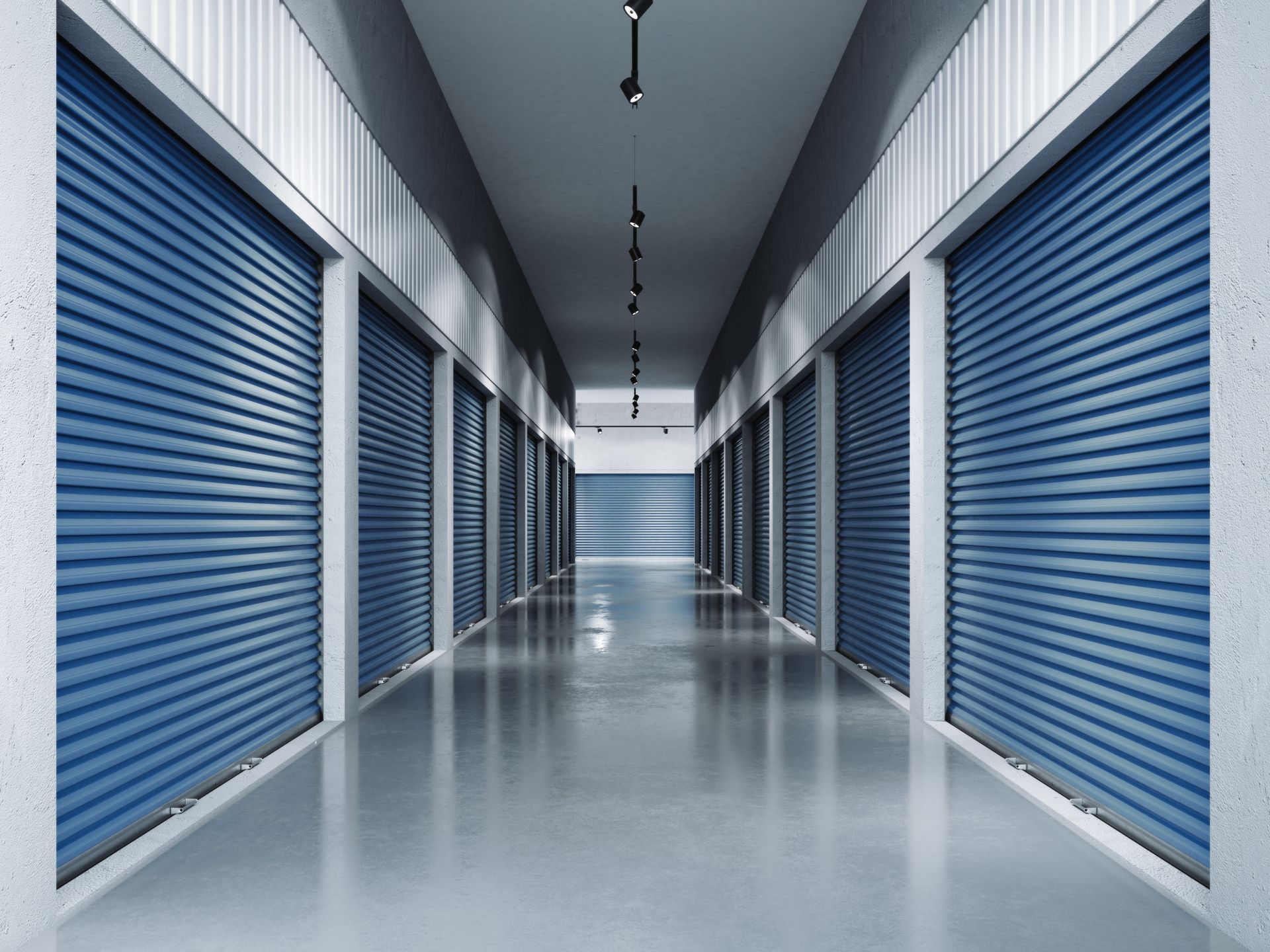 A long hallway with blue shutters on the doors