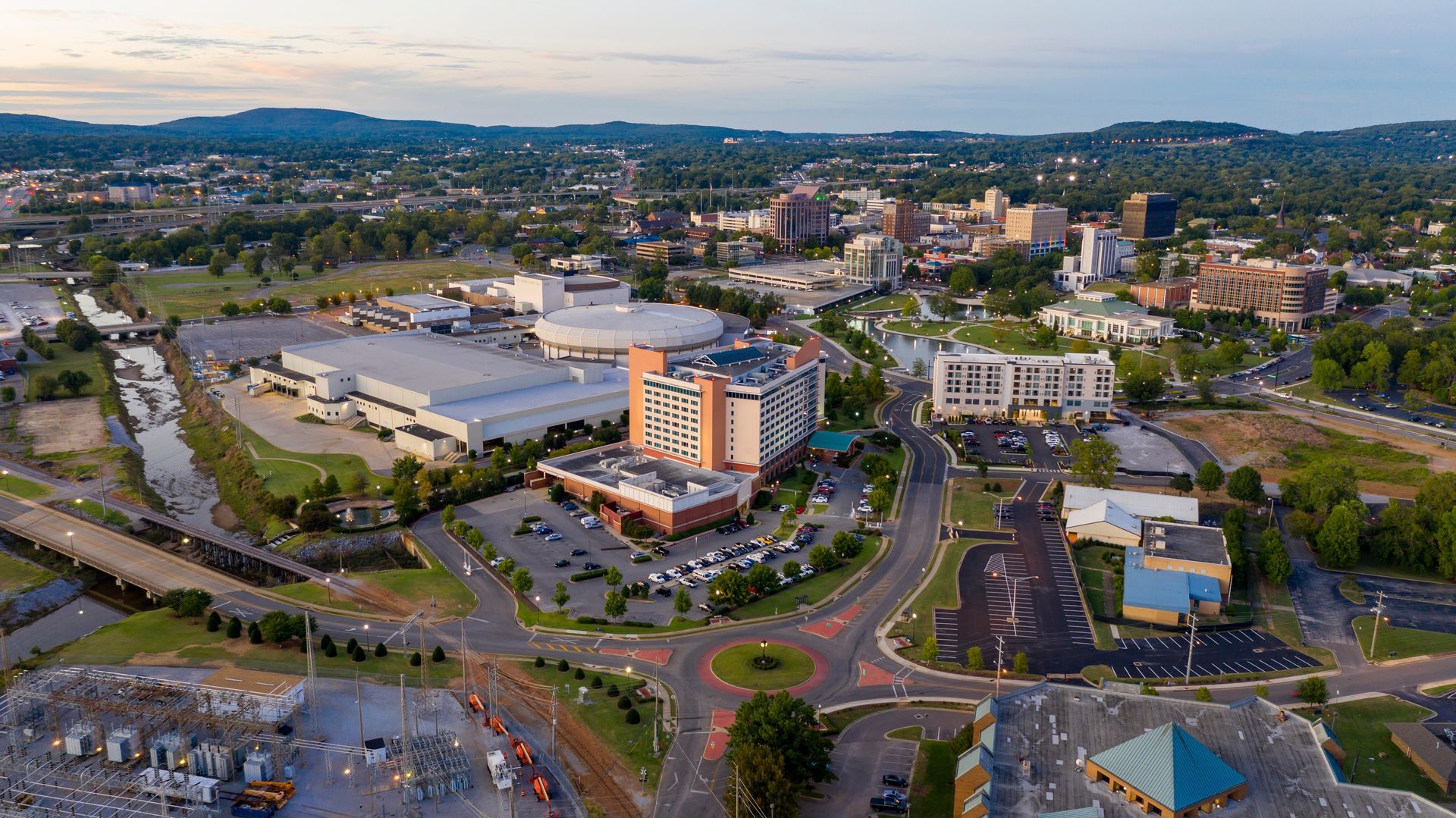 An aerial view of a city with a lot of buildings and trees.