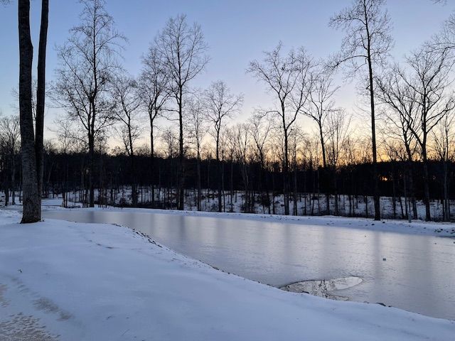 Snowfall at the Red Coach Resort Camp B Koi Pond