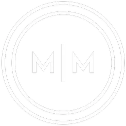 A white logo with two mirrored letters 