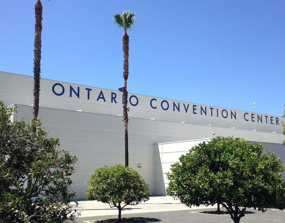 A white building with the word ontario convention center on it