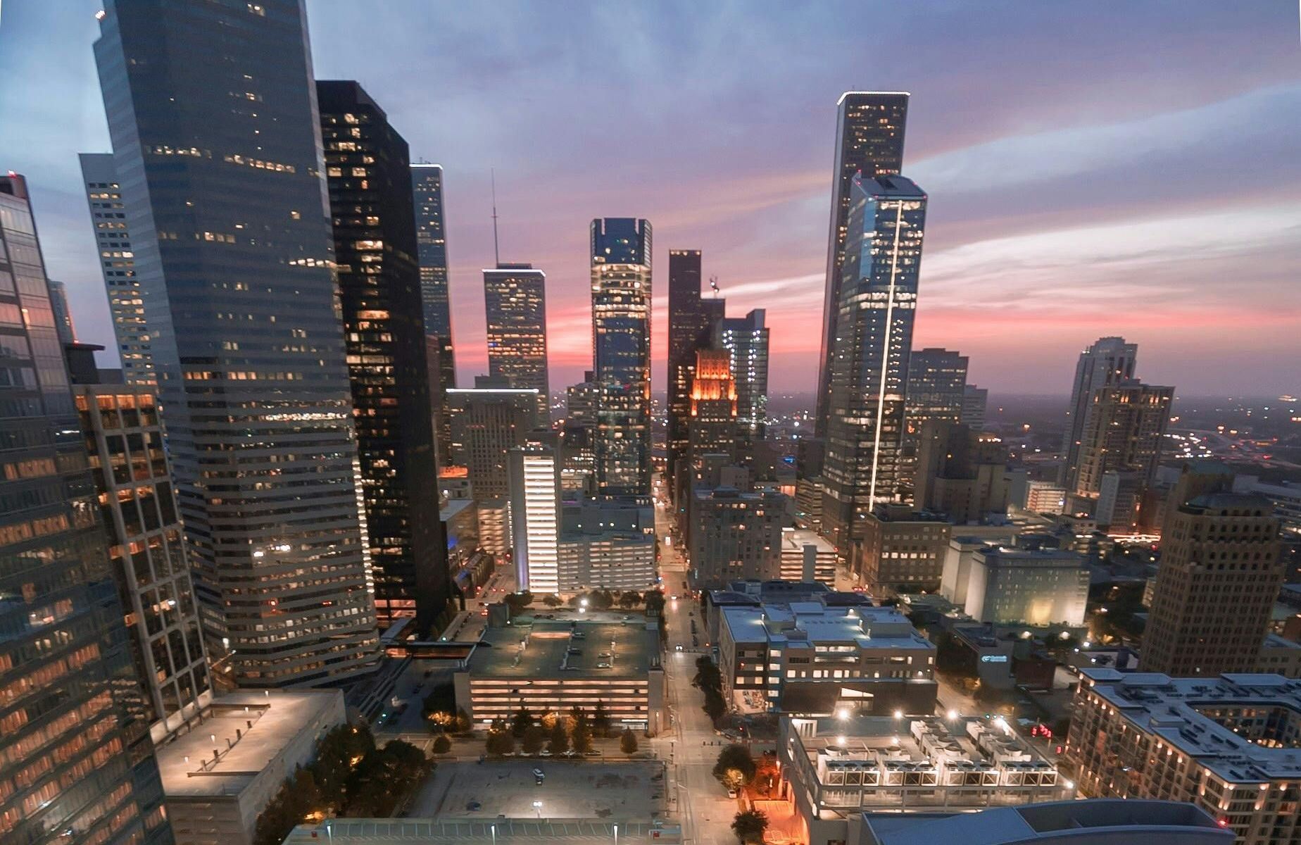 An aerial view of a city skyline at night