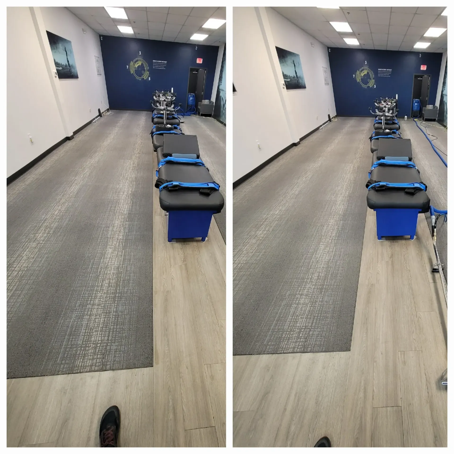 A row of blue benches are lined up in a gym