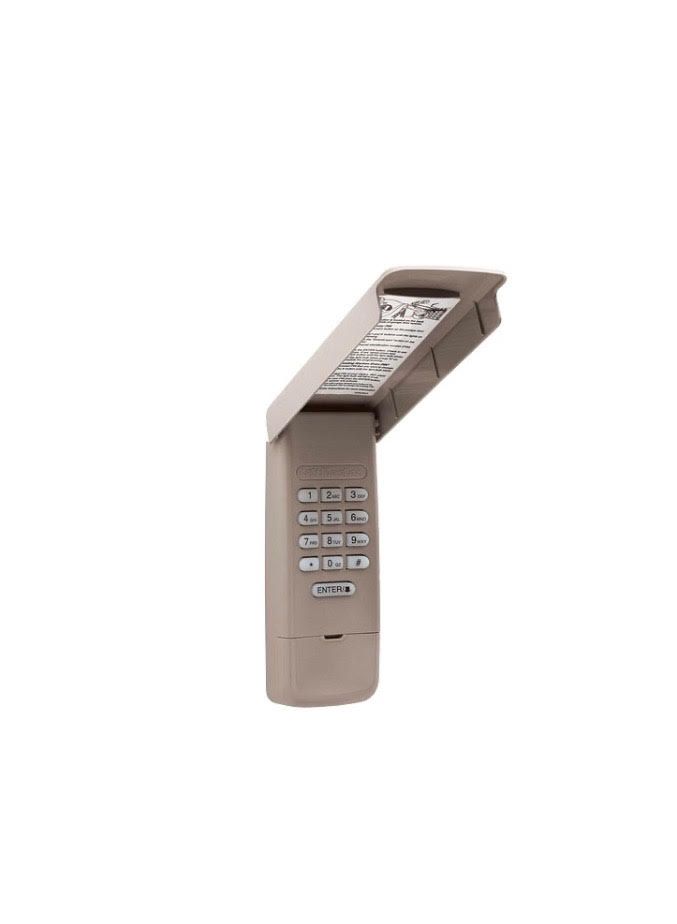 Tan garage door opener keypad with open cover and numbered buttons.