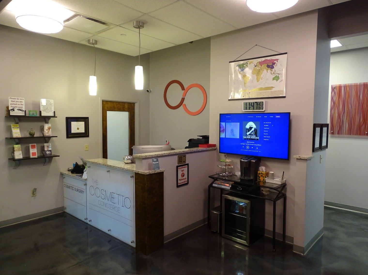 The front desk and reception area of The Cosmetic Concierge office