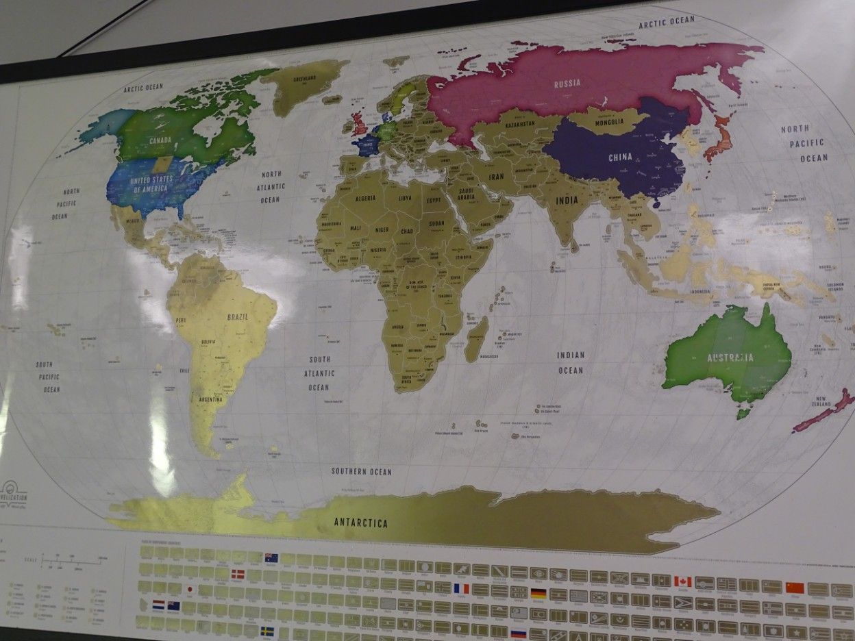 scratch-off world map in The Cosmetic Concierge office