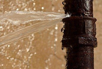 Rusty Burst Pipe — Plumbing Repair in Costa Mesa, CA Rusty Burst Pipe — Plumbing Repair in Costa Mesa, CA