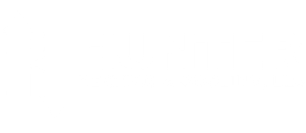 A light-colored wooden table featuring an open book and a small, vibrant green houseplant in a blue ceramic pot.