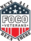 The logo for foco veterans shows a soldier saluting in front of an american flag.