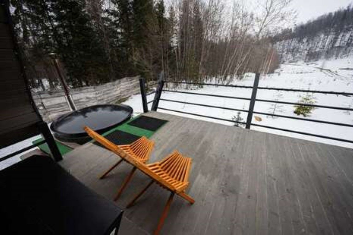 outdoor hot tub with drinks