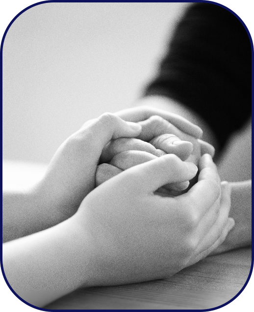 Hands holding another person's to help process depression