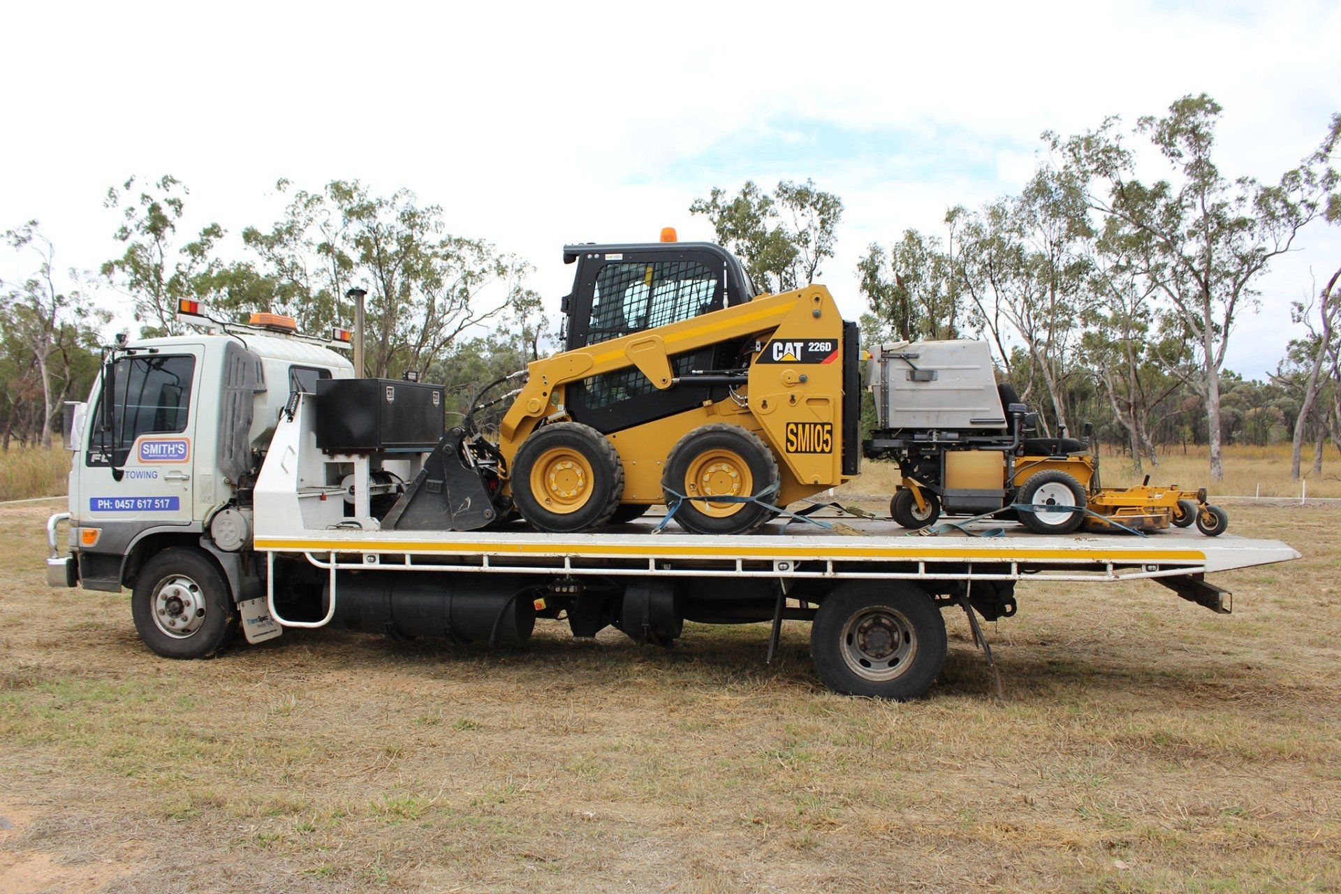 Worker on Lawn Mower — Transport & Equipment Hire in Moranbah, QLD