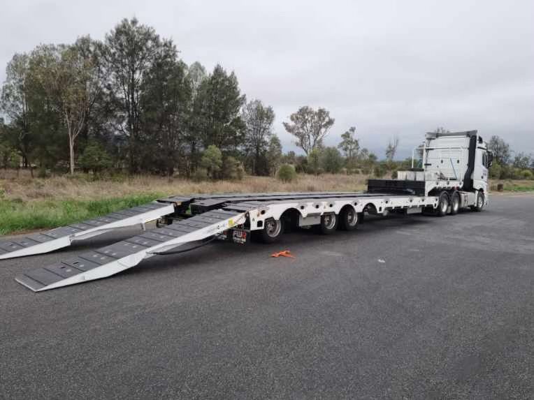 Excavator on Float Truck — Transport in Moranbah, QLD