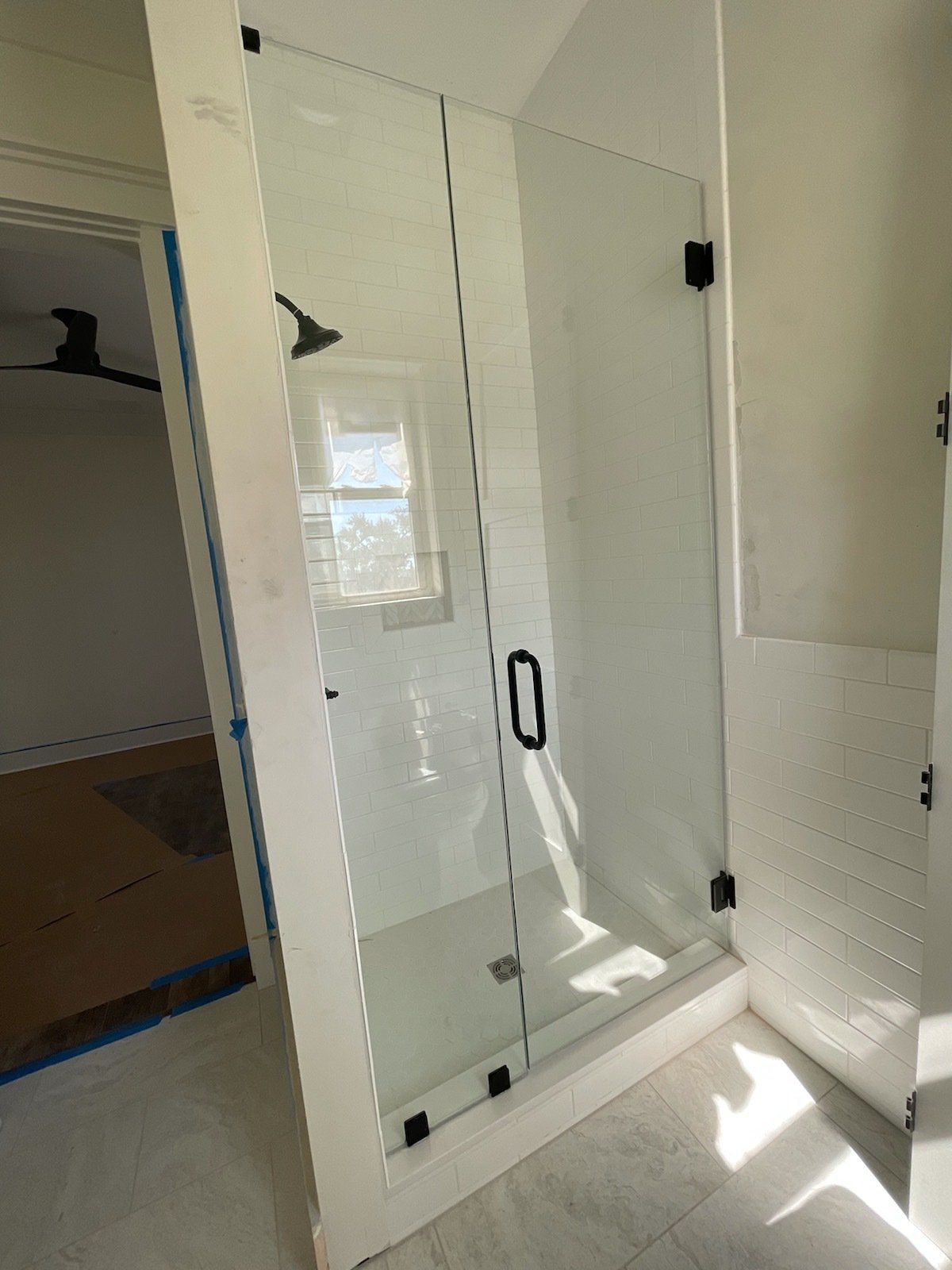 glass door for a shower surround