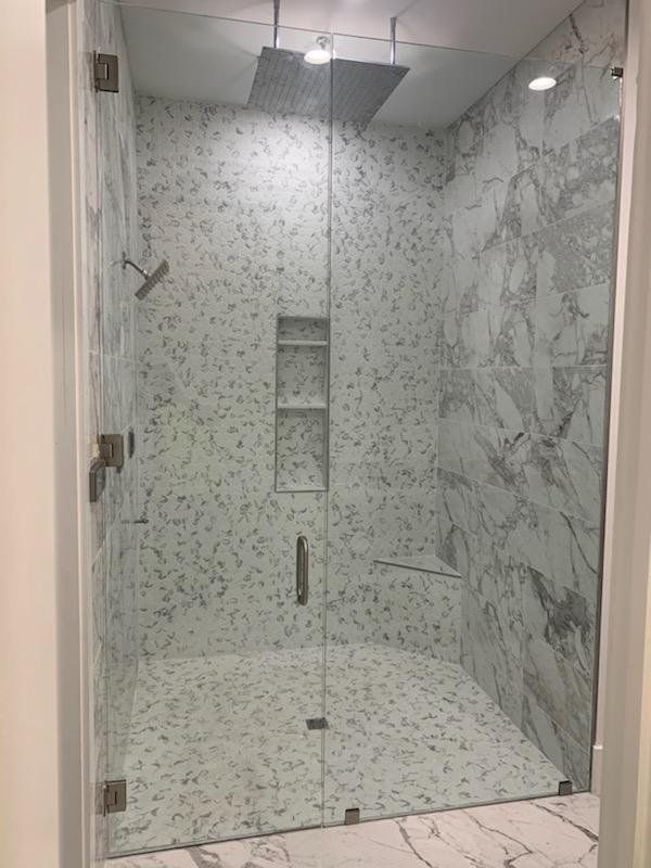 bathroom with glass shower doors