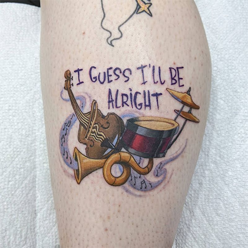 A tattoo on a leg that says i guess i 'll be alright