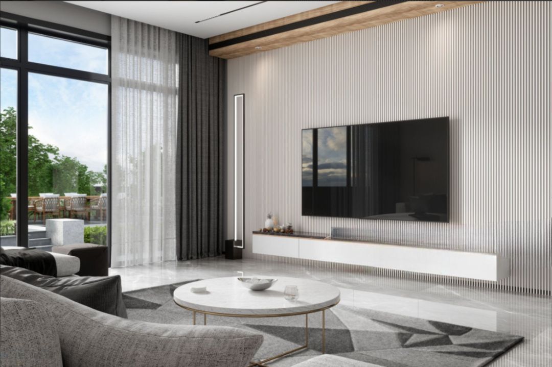 Modern living room with TV on white wall, gray sofa, and large window