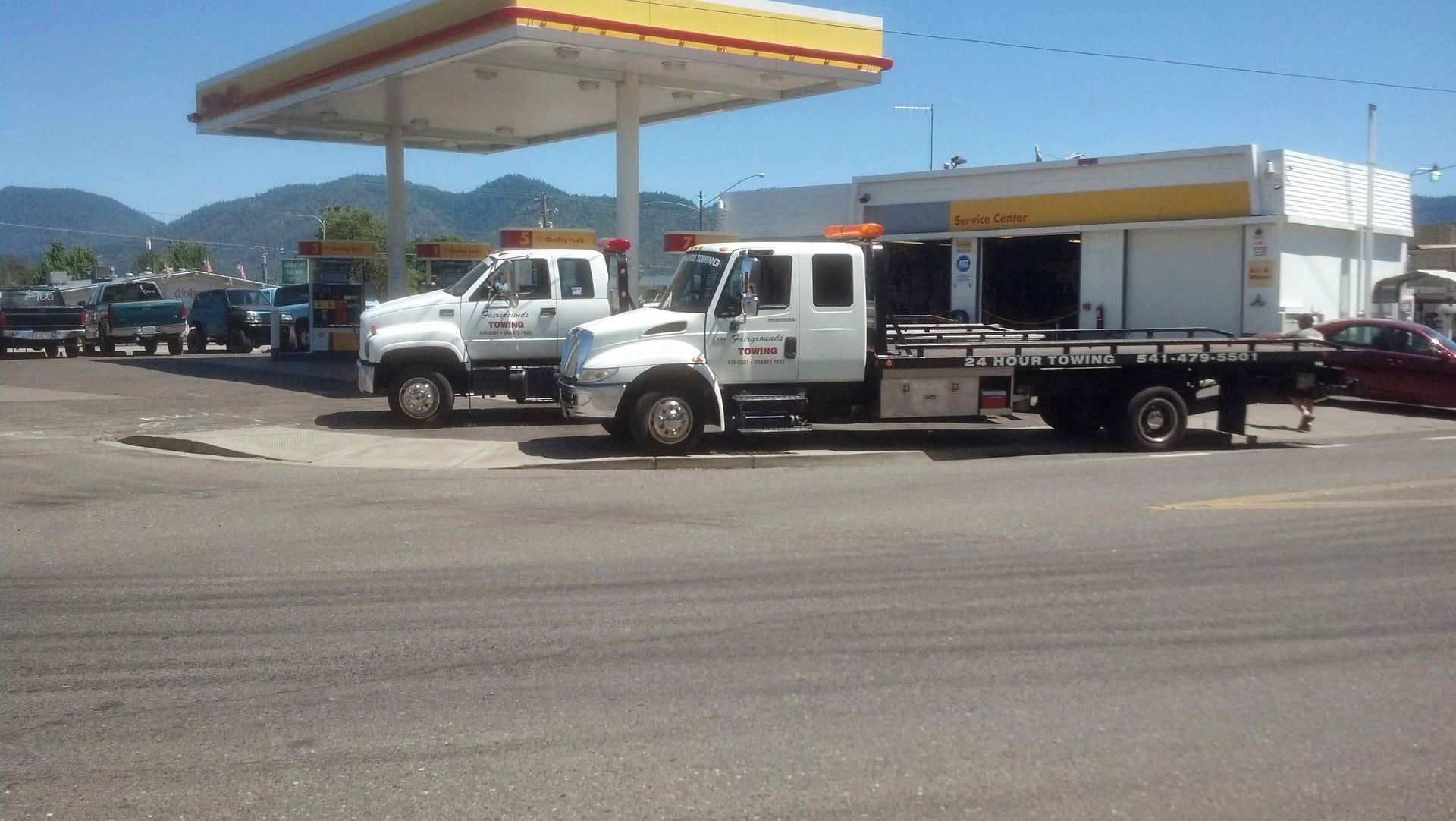 Two Tow Trucks Are Parked — Grants Pass, OR — Fairgrounds Towing & Fuel LLC