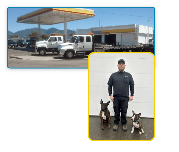 A Man Kneeling Next To Two Dogs In Front Of A Tow Truck — Grants Pass, OR — Fairgrounds Towing & Fuel LLC