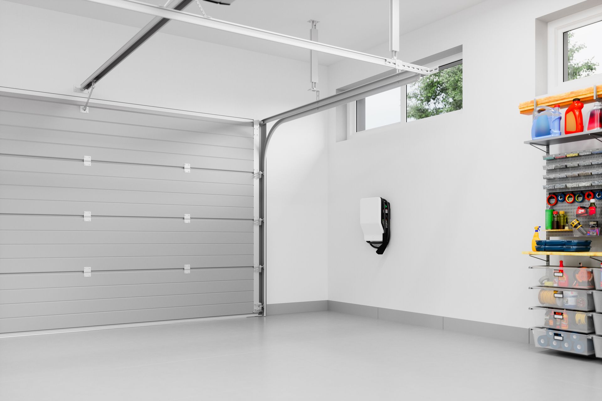 Garage interior with a car charger on the wall, garage door open, and storage shelves. Garage interior with a car charger on the wall, garage door open, and storage shelves.